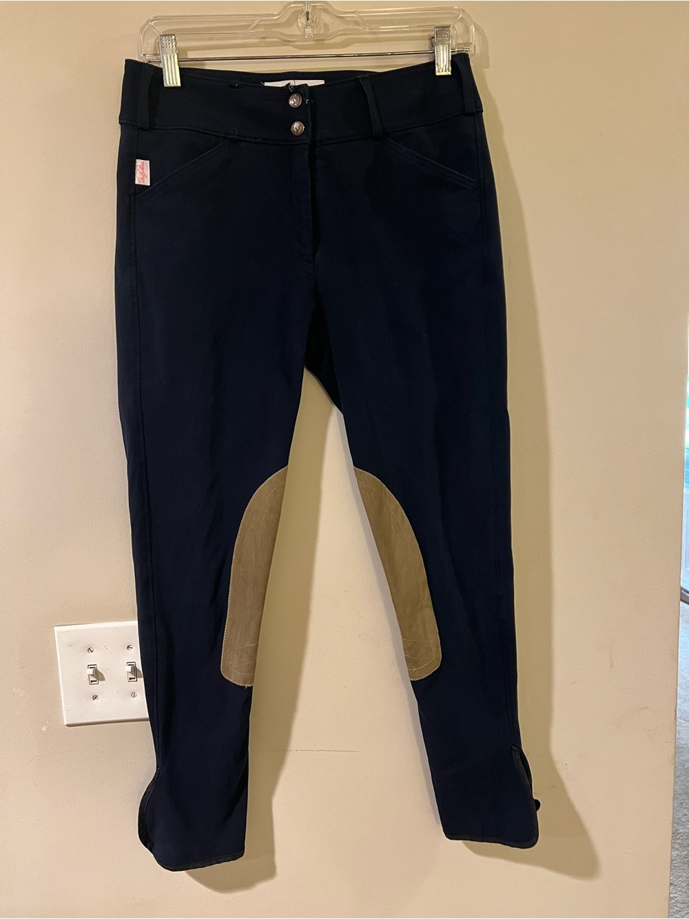 Black breeches size 28, in decent condition missing one belt loop.
Sock bottoms